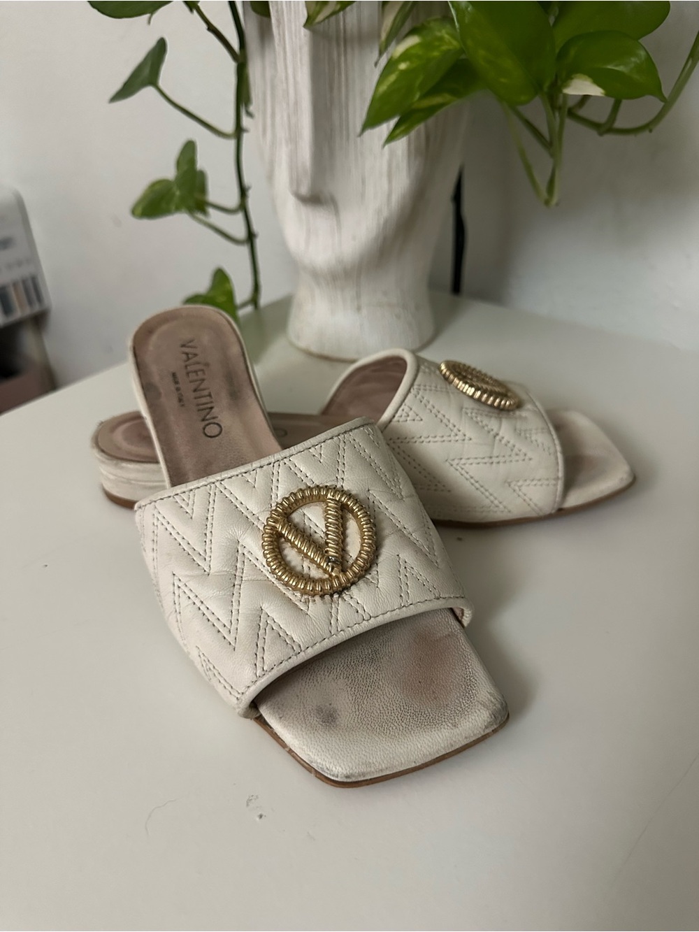 Valentino Cream Quilted Slide Mules with Gold Medallion